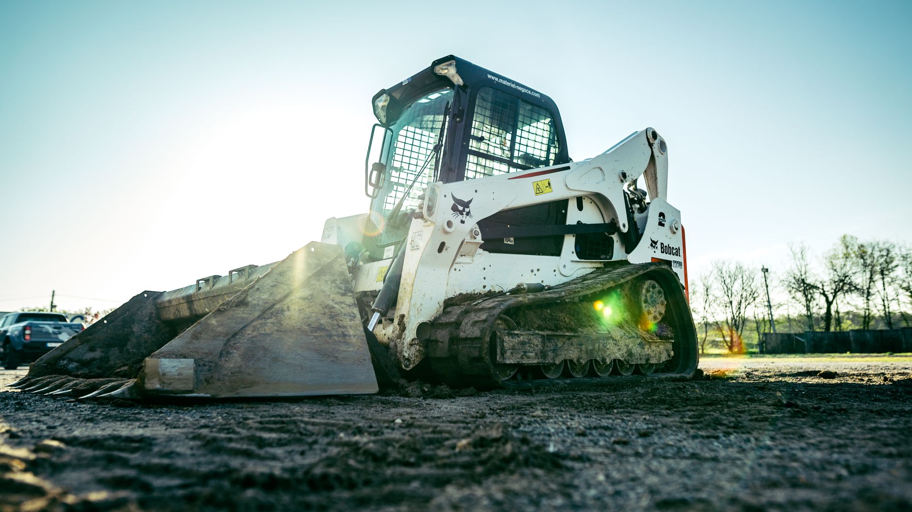 Skid steer being stripped for parts