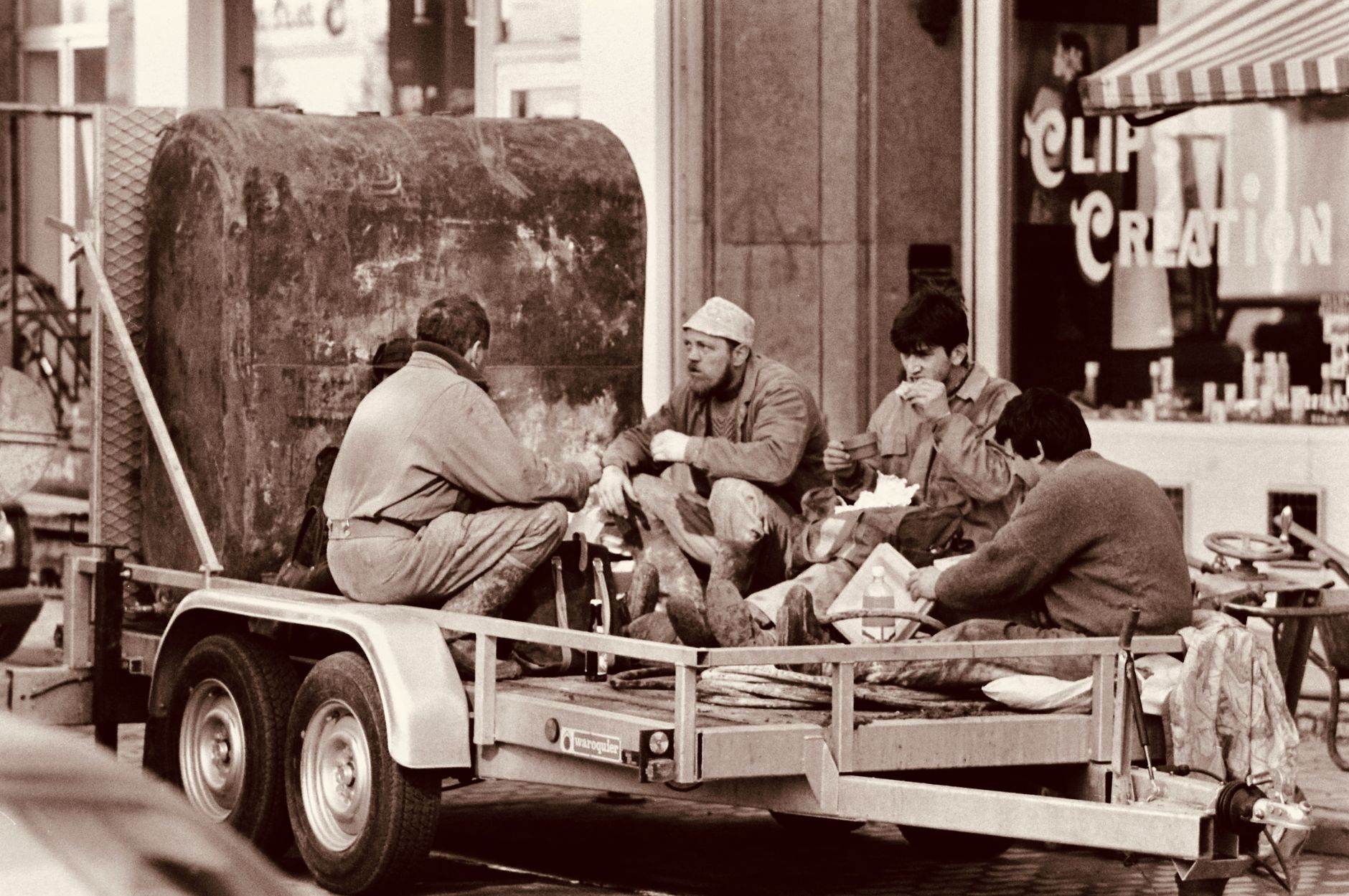 Trailer being loaded onto a rollback for free removal